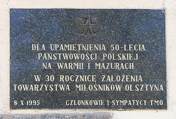 Tablica pamiątkowa Towarzystwa Miłośników Olsztyna, Plac Konsulatu Polskiego 5